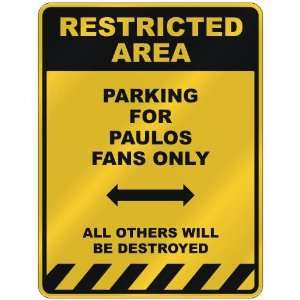  RESTRICTED AREA  PARKING FOR PAULOS FANS ONLY  PARKING 