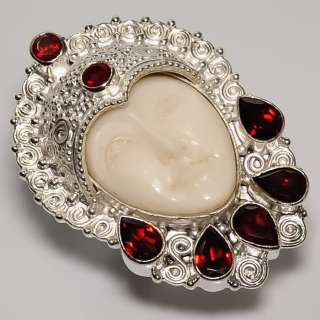 AWESOME  CARVED CAMEL BONE FACE , MOZAMBIQUE GARNET .925 SILVER RING 