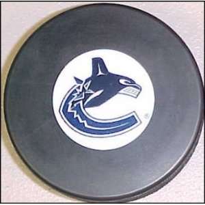  Vancouver Canucks NHL Logo Puck: Sports & Outdoors