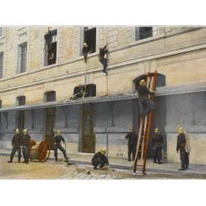 French Sapeurs Pompiers Using Ladders and Hoses at the Site of a Fire 