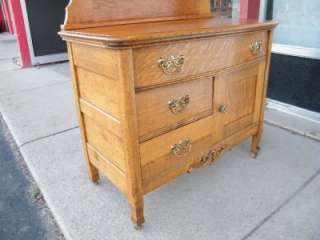 Circa 1895 Golden Tiger Oak Curved Front Commode With Towel Bar