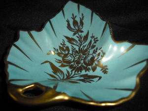 This elegant, sky blue and gold piece is 4.25 long x 4.125 wide and 