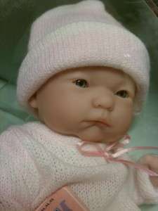 This auction is for an ASIAN baby in PINK and white outfit with 