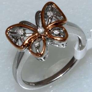   silver and 14k pink gold diamond butterfly shape ring. Size 7.  