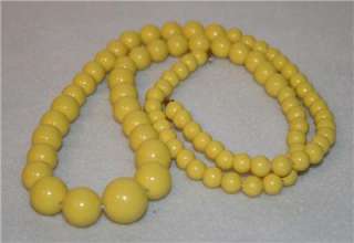Looonngg Vintage Yellow Plastic Bead Necklace  